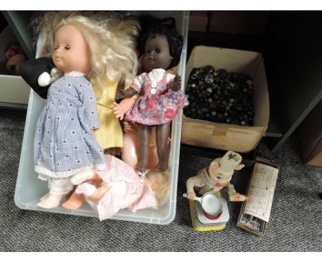 A shelf of 1950's and later Toys including Japanese tinplate and battery operated Piggy Cook, various celluloid Dolls includi