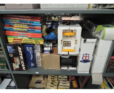 A shelf of mixed Toys and Games including Peter K Bot Robot, Estes Astrocam Rocket, Roller Coaster Kit etc along with a small