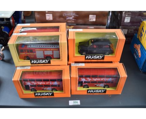 Nine modern Husky diecasts, TY87401 Tour Bus x7, TY83901 Black Taxi and TY87101 Fire Engine, all boxed