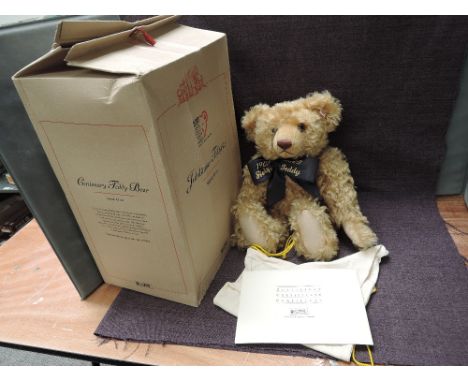 A modern Steiff Limited Edition jointed Teddy Bear, 670985 Centenary 03963, having growling mechanism, white tag, certificate