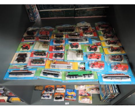 A shelf of ERTL Britt Thomas The Tank Engine and similar Accessories, approx 36, all on bubble cards