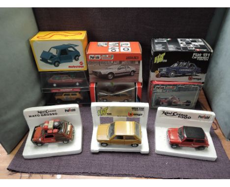 Ten 1:24 and similar diecasts, Nacoral Ford Fiesta &amp; Morris Mini 1000, Polistil S675 Ford Fiesta, FX9 Ferrari 312 T2 F1, 