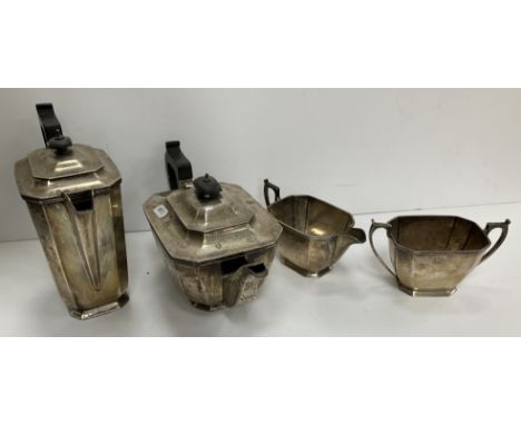 A George VI silver four piece tea set comprising teapot, water jug, sugar basin and milk jug (by George Howson for Harrison B