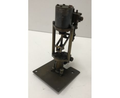 A Stuart Turner stationary engine fitted with feed pump and governor 11.5 cm high.