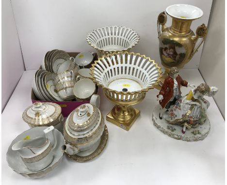 A 19th Century Coalport type fluted and gilt decorated tea set comprising tea pot and stand, sugar box and cover, slop bowl a