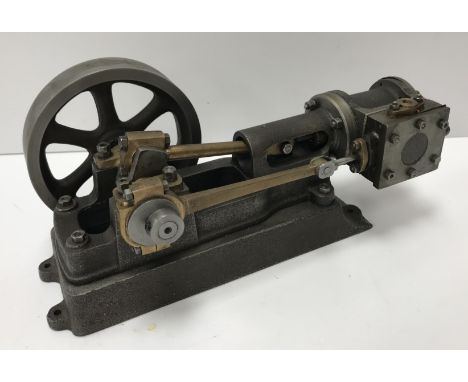 A Stuart Turner No. 10H stationary engine, grey metal throughout 21 cm long.