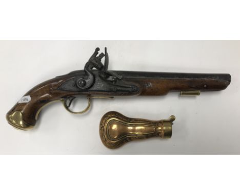 A George III flintlock pistol with straight grained walnut woodwork, the side panel engraved with crown and GR and verso to t