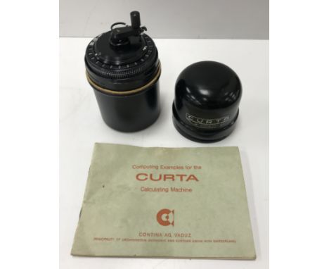 A Curta type 2 calculator with military green type main body inscribed to base "Type 2 No 523646 made in Leichtenstein (Custo