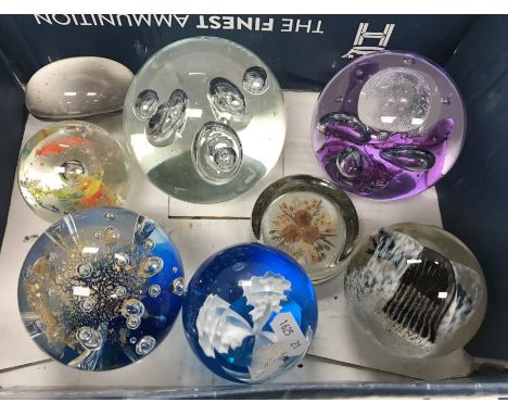 A collection of eight various 20th Century glass paperweights, unnamed together with a wooden box containing various vintage 