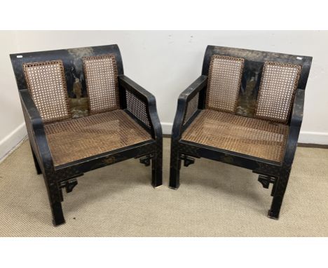 A pair of early 20th Century black lacquered and chinoiserie decorated caned low arm chairs on square supports, 59 cm wide x 