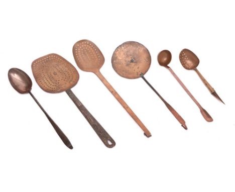 Three copper and metal skimmers:, a copper and metal handled hanging spoon, a copper ladle, the handle with engraved terminal