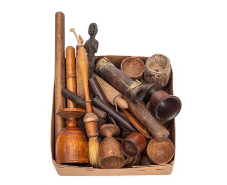 A collection of treen: including various egg cups, small roller, thermometer in wood holder, folding measure, bodkins, etc.