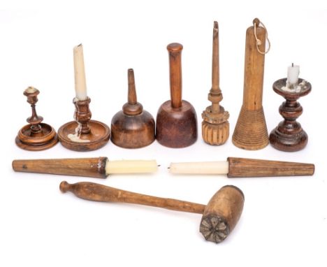 Five wooden candlesticks: of various designs, two wood mallets, wood funnel, a roller, an 18th Century brass mounted wood ket