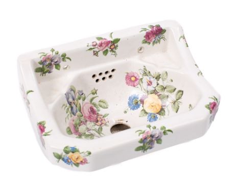 A French pottery wash basin:, printed decoration with sprays of flowers and foliage, 36 x 26cm.