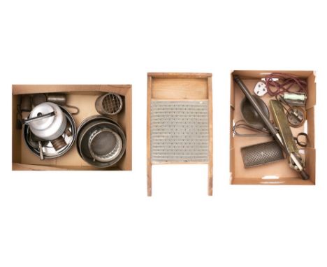 A collection of kitchenalia: including metal whisk, grater, strainer, thermometer, small iron washboard and various tins.