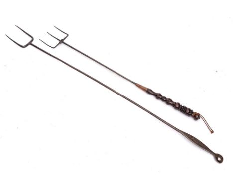 A three pronged metal toasting fork: with copper mounted turned wood handle, 62cm long and a metal twin pronged fork; the han