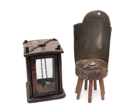 A Continental pricket rustic candle lamp: with concave sheet metal shield, the circular wood platform on seven chamfered spla
