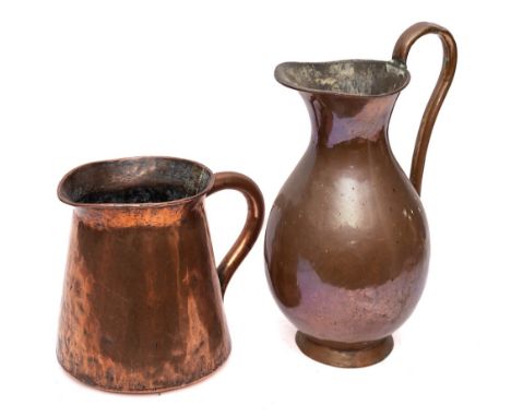 A 19th Century copper pitcher: of baluster shape with open scroll handle, 42cm high, also a 19th Century copper jug of tapere