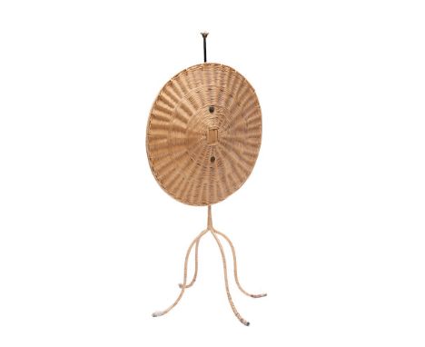 A rare early 19th Century adjustable wicker work firescreen: with circular panel and quadruple splayed base.