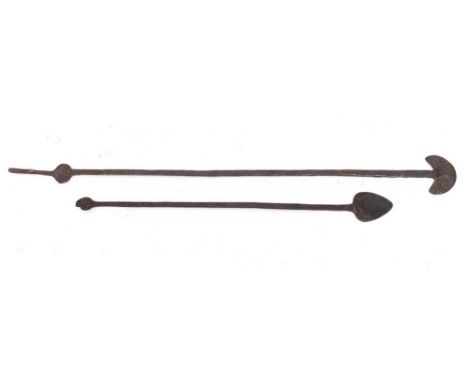 An iron pig gut/intestine scraper: with heart-shaped blade and hooked end, 16th/17th Century, 48cm long, also an iron scraper