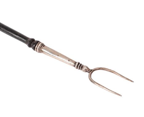 A silver twin pronged toasting fork: with ebonised turned handle, 61.5cm long, London 1894. 