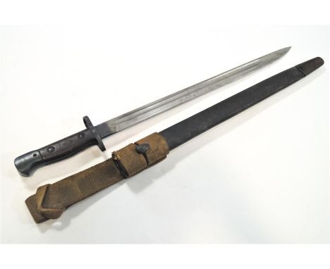 An English Wilkinson 1907 pattern bayonet with original frog and an associated scabbard, 58cm long (max)