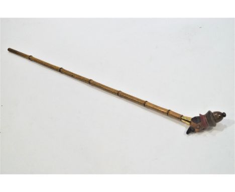 A walking stick, the knop being a gentlemans head