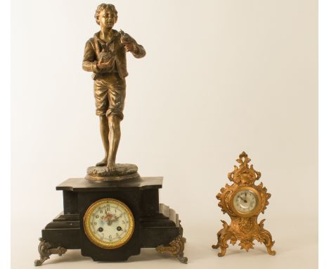 Two decorative French mantel clocks, early 20th century - comprising a spelter and slate figural clock, with a spelter figure