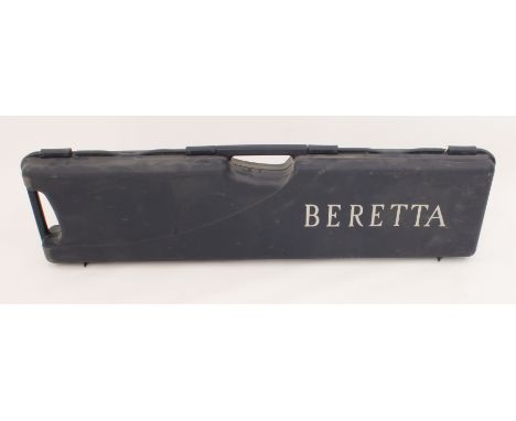 A Beretta over-and-under hard gun-case and its contents: three 20-bore chokes (IC, M and SK) and choke-key; a pair of 20-bore
