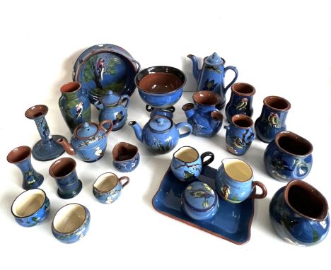 A collection of blue glazed Torquay pottery - including pieces with seagull, parrot, kingfisher, heron, piskie, Scandy and fl