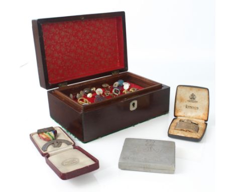 A small mahogany box (LWH 22 x 14.5 x 9.5 cm) and its contents: Royal Ark Mariner’s silver breast jewel in its a maker’s case