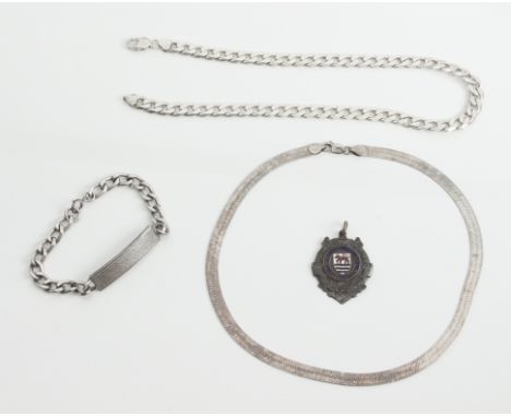 A small group of silver jewellery - including a heavy curb link necklace and bracelet; a vintage 1970s-80s flexible necklace;
