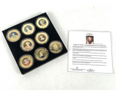 A set of eight 24ct gold plated medallions: The Tudor Commemorative Series - depicting Henry VIII and his six wives, in prese