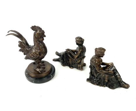 Two bronze book ends in the form of seated classical figures, 15cm high - and a modern bronze figure of a cockerel on a marbl