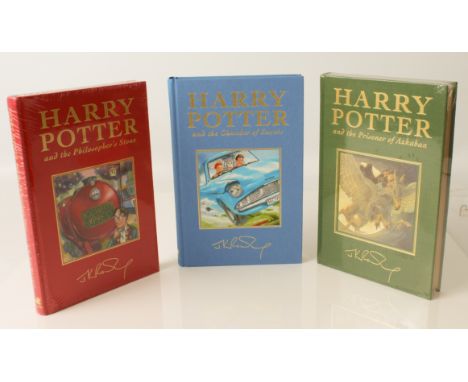 Rowling, J.K. - a set of three Bloomsbury deluxe edition Harry Potter hardbacks, medium 8vo, cloth-bound with gold titles to 