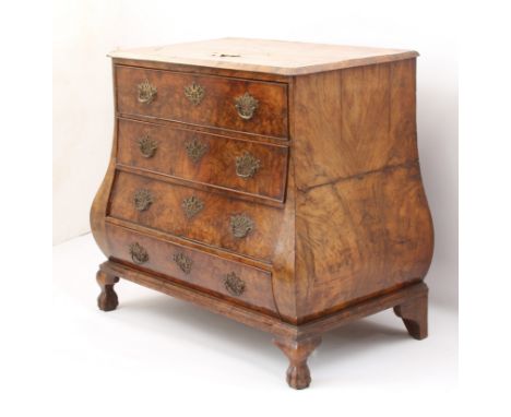 A Dutch 18th century burr and figured walnut bombe chest-of-drawers - the bevelled top over four cockbeaded, oak-lined drawer