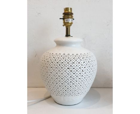 A Laura Ashley Home white glazed ceramic table lamp - ovoid form with reticulated decoration, 28.5cm high inc. fitting; toget