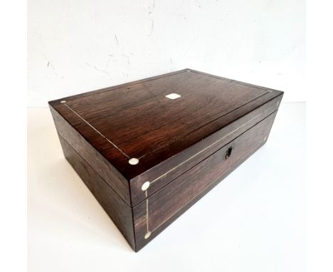 A mid-19th century rosewood and mother of pearl writing slope - the rectangular slope with silvered metal stringing, the orig