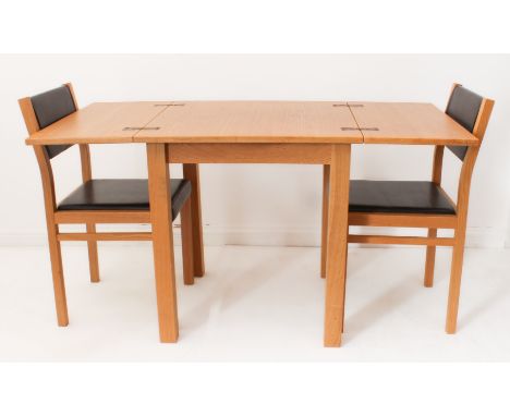 A light oak square extending kitchen breakfast or dining table - modern, Italian, the split top unfolding to extend (LWH 70 x