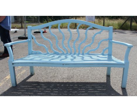 A light-blue-painted wooden garden bench