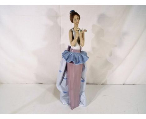 Lladro - a large Lladro figurine entitled An Expression of Love #6592 stamped and impressed marks to the base, approximate he