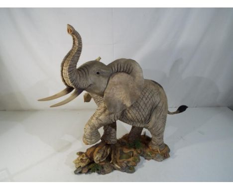 Tuskers - a large figurine by Tuskers, depicting an elephant, entitled The Gentle Giant, issued in a limited edition, item #1