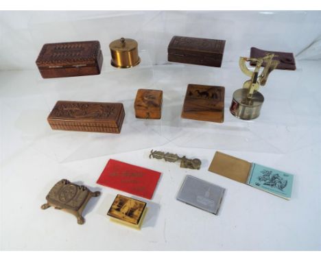 A quantity of postal related collectables to include wooden stampboxes, two metal cased stamp rolls, Sovereign scales, stamp 