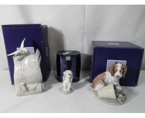 Lladro - three boxed pieces by Lladro to include #7685 A Friend for Life, #7672 It Wasn't me and #7677 Art Brings US Together