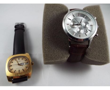 A lot to include a gentleman's retro Timex wristwatch and a further gentleman's wristwatch by District Est £40 - £50