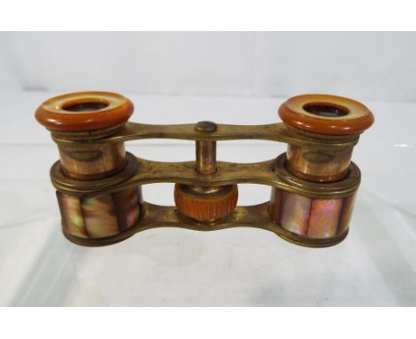 A vintage pair of miniature binoculars marked RT in original case Est £20 - £40. 
