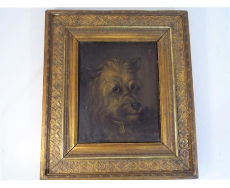 An oil on canvas portrait from mid to late -19th century depicting a Scottish terrier, signed W.C., in its original wood Gess