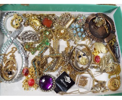 A good mixed lot to include a quantity of brooches, paired earrings, two lady's wristwatches with expandable bracelets to inc