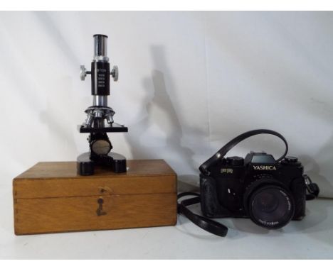 A vintage Yashica FR camera and a Stein microscope in a wooden case, Est £20 - £40 [2]