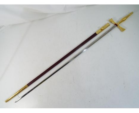 A Masonic type sword and scabbard, approximately 70 cm blade. Estimate £30 - £50